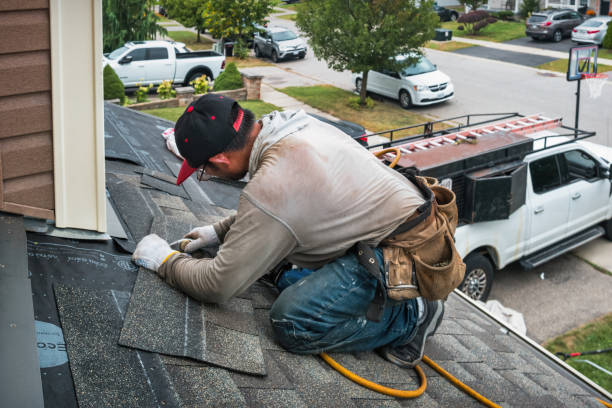 Professional Gutter Repair And Installation technician working in Pleasanton, KS